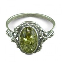 Oval green amber fancy surround