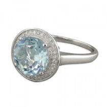 Large round blue topaz with cubic zirconia halo