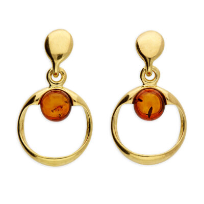 Gold-plated cognac amber bead situated at the...